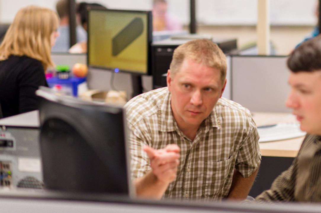 two ThermoAnalytics software developers discussing the code