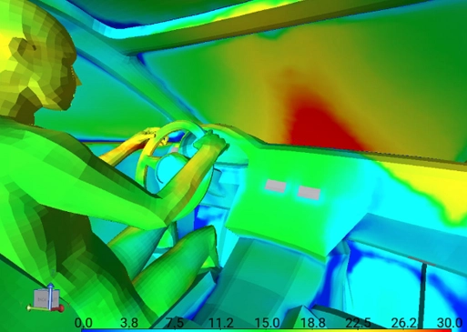 application-sample — Interior cabin thermal map showing temperature distribution around a driver and dashboard during defrost conditions.