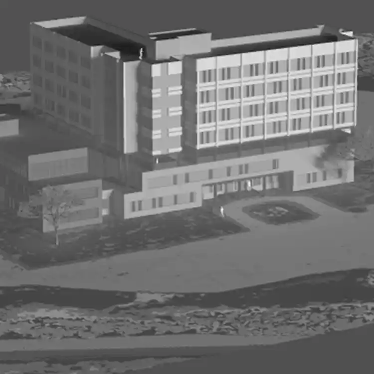 application-sample Grayscale infrared rendering of a multi-story building and surrounding landscape.