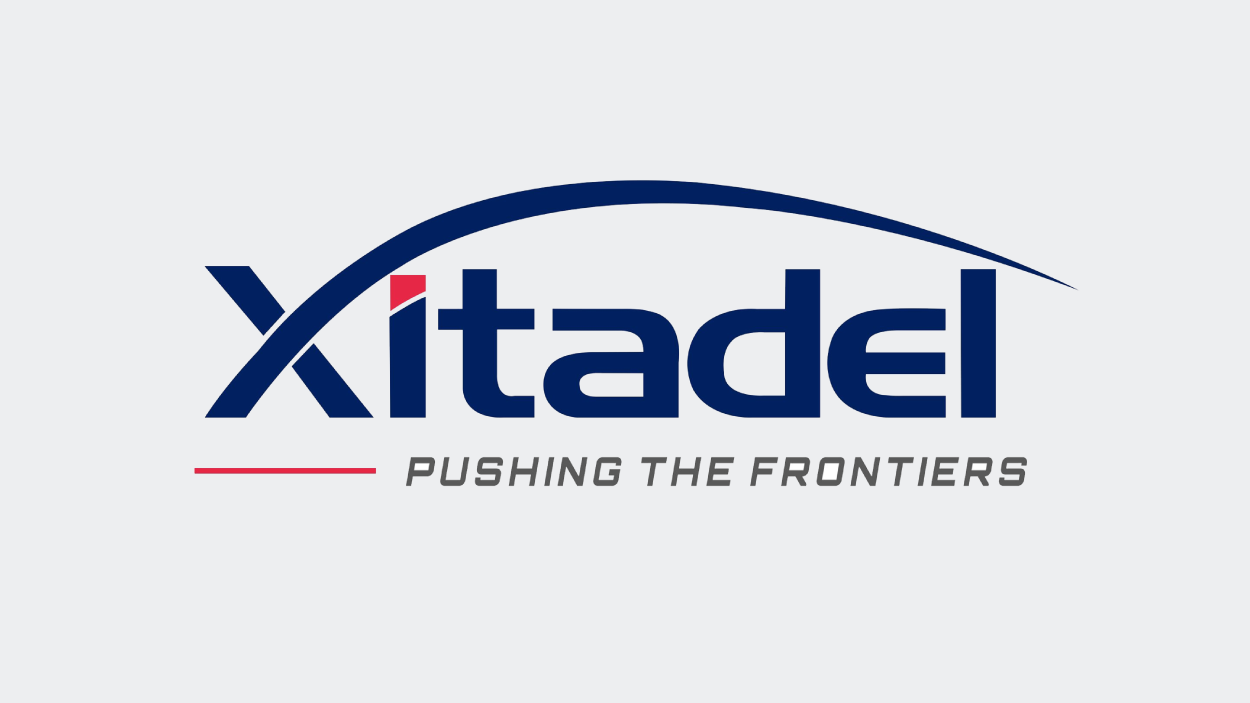 Xitel logo with tagline “Pushing the Frontiers” and curved line graphic.