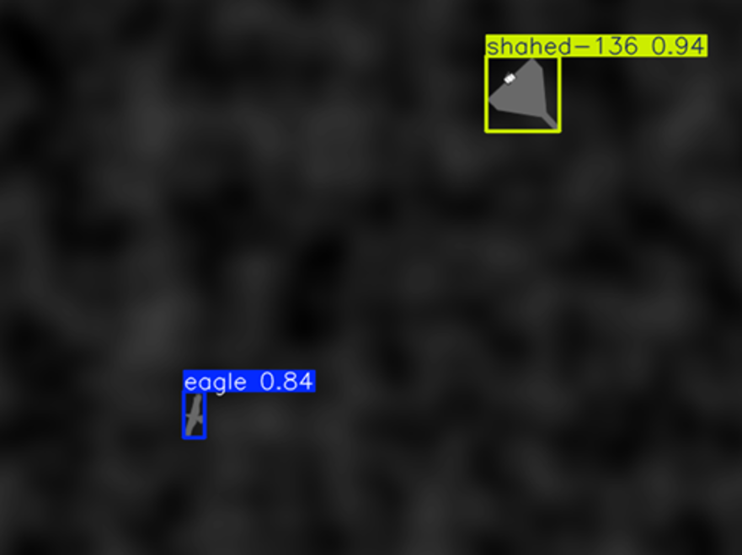 Automated Target Recognition system output showing a drone and a bird identified with confidence scores on an infrared image